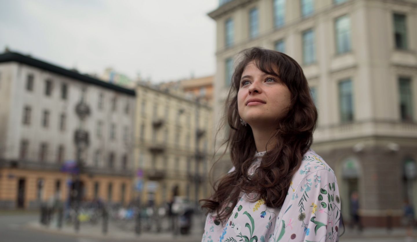 Martyna Kaczmarek looking thoughtful on St Saviour’s Square, Poland
